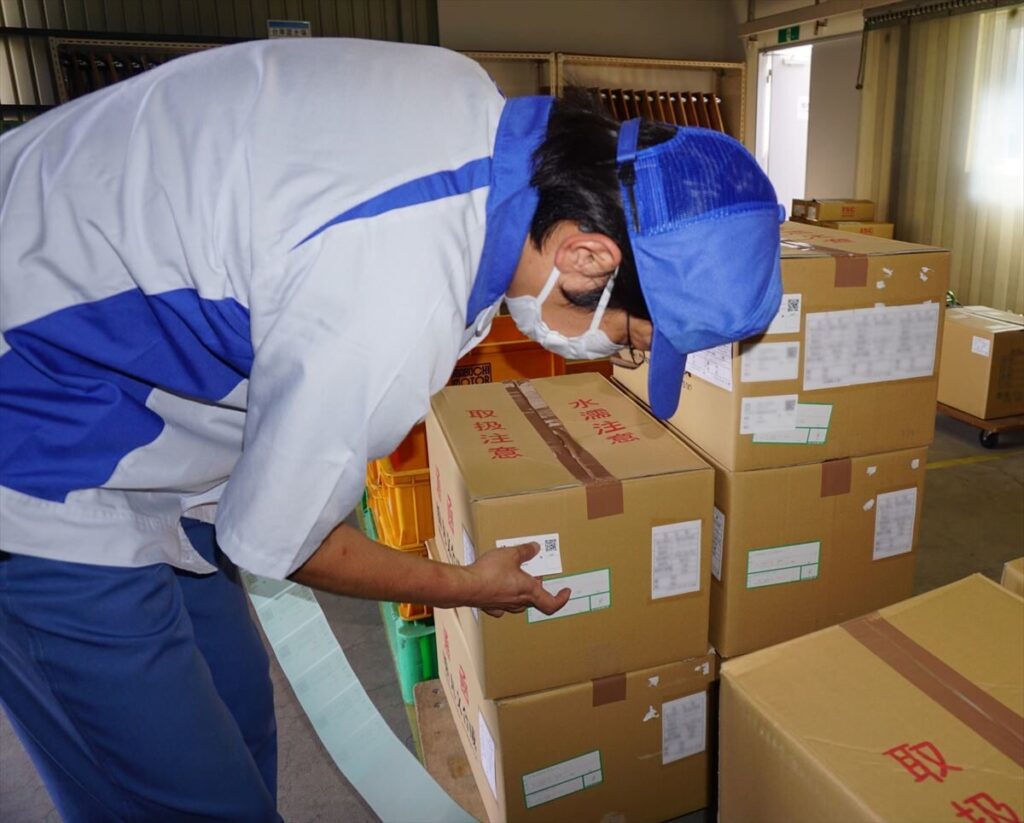 マブチモーターオーケン株式会社様:ラベル貼付作業